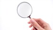© Elchin Abilov - Female hand holding a magnifying glass isolated on a white background A mockup design with copy space perfect for adding personalized text or creative content