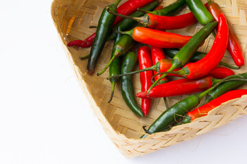 A picture of green chilies and red chilies. Green chilies are high in vitamin C and beta-carotene, making them good for the skin. 