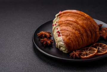 Crispy sweet red croissant with pistachio, raspberry and strawberry