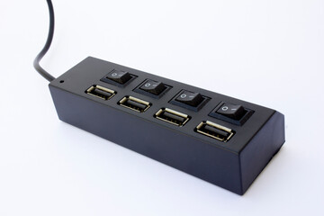 A black multiport USB hub is a device that allows you to connect multiple USB devices to a single USB port on your computer.