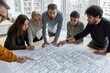 © Road Red Runner - A diverse team of architects collaborates on a building project while gathered around a detailed architectural blueprint indoors