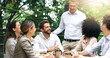 © JordaanExams/peopleimages.com - Restaurant, meeting and happy business people at lunch for planning, discussion and b2b networking. Teamwork, collaboration and men and women laugh in cafe for talking, chatting and conversation