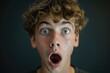 © Alena - A person with a surprised expression on their face