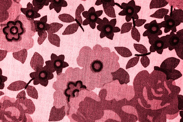 pink floral pattern on fabric.  wallpaper in a rustic modern design.   pink textile texture.