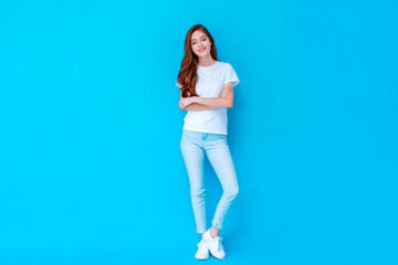 Wall Mural - Full length body size view of attractive cheerful girl posing copy empty space isolated over bright blue color background