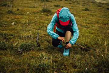 Poster - Woman trail runner running in grassland