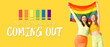 © Pixel-Shot - Beautiful young lesbian couple with LGBT flag on yellow background