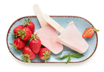 Wall Mural - Plate with sweet strawberry ice-cream popsicles on white background