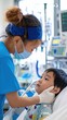 © PixelQraze - Asian Pediatric Hospital Staff Caring for Young Patients in Medical Setting