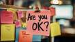© CozyDigital - Are you okay? Colored sticker with the inscription. Employee mental health at work. Team care for colleagues