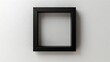 © Raitalinn - A minimalist black frame on a white wall invites possibilities.