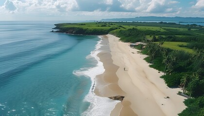 Serene aerial view of a secluded tropical beach with pristine sands and clear turquoise waters