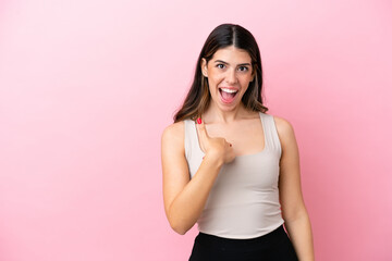 Wall Mural - Young Italian woman isolated on pink background with surprise facial expression