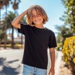 © Alena - Kids black oversized tshirt mockup. Handsome long hair teen boy model wearing basic crewneck t-shirt mock up. Youth regular shirt, front view of casual tee, young urban lifestyle, summer street
