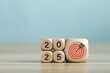 © Pcess609 - 2025 year with the target which prints screens on wooden cube blocks with ideas for Business plans and goals and strategies that will lead to business success and a better life in the new year.
