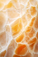 Wall Mural -  A tight shot of an orange-yellow wall, glowing as light bounces off its textured surface