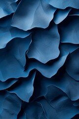 Wall Mural -  A tight shot of a blue wall featuring undulating waves of wavy, blue material on its peak