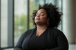 © DigitalMagicVisions - Tranquil Plus-Size Woman in Meditative Yoga Pose Calming Anxiety with Deep Breathing