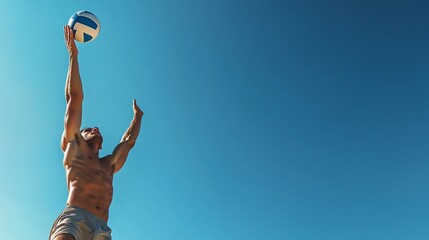 Poster - A man in shorts reaches up to bump a volleyball against a blue sky.