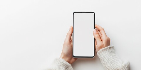 Canvas Print - Female hands holding modern cellphone. Close up of woman hands holding smart phone with blank screen. Empty smartphone white screen ready for your app to be placed isolated on white background