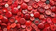 © Autun - A cluster of red buttons in a seemingly haphazard arrangement, each one distinct in size, shape, and texture, inviting the viewer to explore.