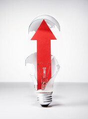 Wall Mural - Light bulb and red arrow.
