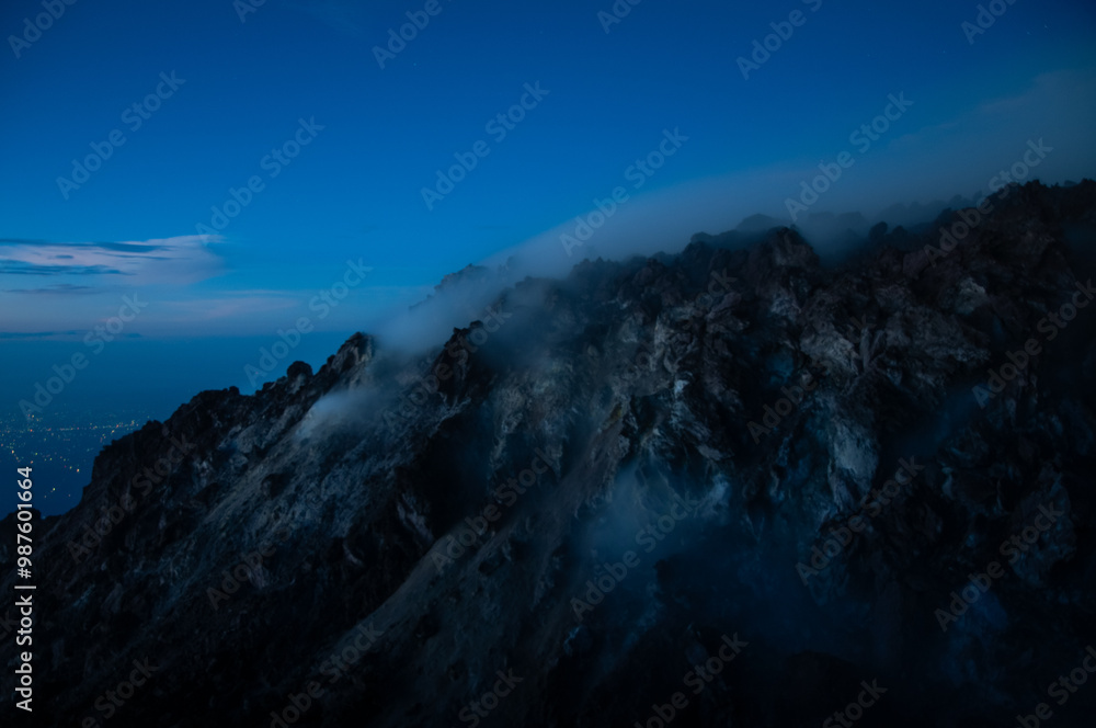 Night view of sulphurous smoke from Merapi Volcano coming out of the ...