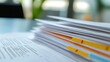 © Itsaraporn - A close-up of legal documents with highlighted sections on new business rules