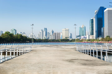 empty concrete floor with cityscape view