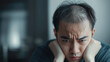 © Antto-AI - Struggling with hair loss, man shows deep concern and frustration