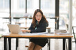 © Wicitr - Asian businesswoman working on digital laptop computer at table office. Technology and digital marketing online concept.