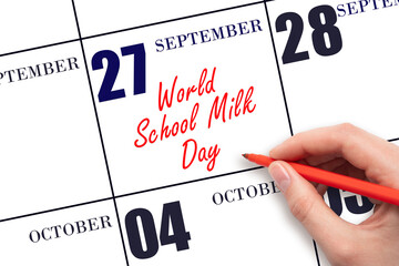 Wall Mural - September 27. Hand writing text World School Milk Day on calendar date. Save the date.