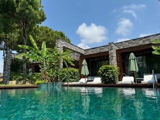 Sticker - Outdoor swimming pool with clear water at luxury resort