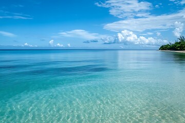 Poster - Tropical beach with clear blue water, white sand, and fluffy clouds