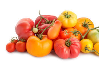 Different sorts of fresh ripe tomatoes isolated on white