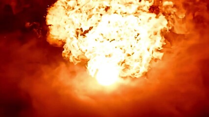 Fire and smoke of explosion or lava from active volcano moving to the camera.