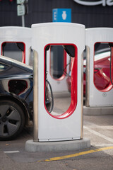 Plugged in electric cars at EV charging station