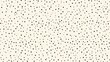 © panumas - A white background with black dots. The dots are scattered all over the background. The background is very simple and clean