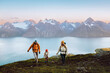 © EVERST - Family travel lifestyle - mother, father, and child hiking together in mountains adventure trip in Norway, parents and kid on active vacations outdoor climbing peak, healthy lifestyle tourism hobby