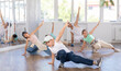 © JackF - Concetrated preteen boys and girls studying movement of contemporary dance in classroom with his friends