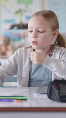 Poster - Girl, writing and counting in classroom for education, thinking or problem solving for maths test at academy. Child, exam or assessment with solution, learning and development with progress at school