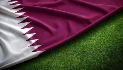 waving Qatar flag, on top of football field background, Qatar soccer team