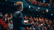© INT888 - A motivational speaker engaging an audience at conference, inspiring and captivating attendees with his presentation.