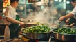 © mabreart - Asiatische Köche kochen Fleisch und Gemüsegerischte in der Restaurantküche