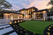 © Sanchai - A modern luxury home at sunset, with large windows, manicured lawns, and outdoor lighting highlighting the architecture