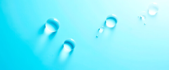 Wall Mural - Water Drops on Blue Background