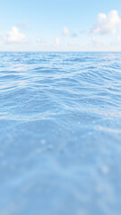 Wall Mural - Calm Blue Water Surface with Blurred Sky Background