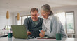 © WesLens/peopleimages.com - Senior man, woman and laptop with paperwork, writing and happy with profit, investment and retirement. Elderly people, couple and computer with documents for pension, review and financial freedom