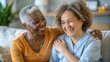 © N7 - Supportive Nursing Environment - A senior Black woman feeling loved and valued.