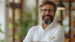© SS Digital - Happy cheerful man with thick beard, moustache and friendly positive smiling face. Portrait of professional entrepreneur, white collar office worker, corporate manager, college